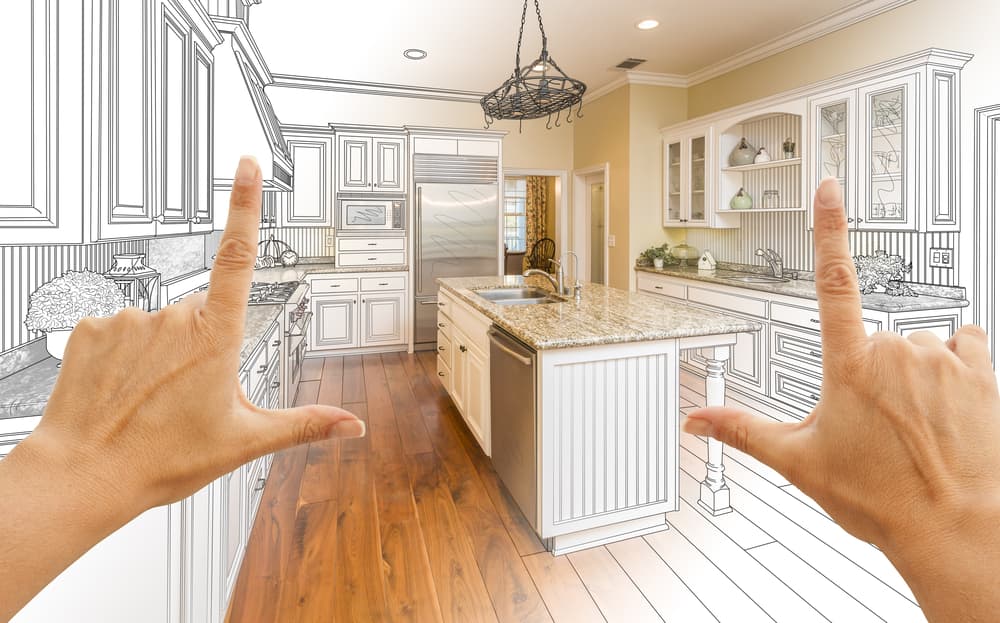 Kitchen remodeling visualization with hands framing